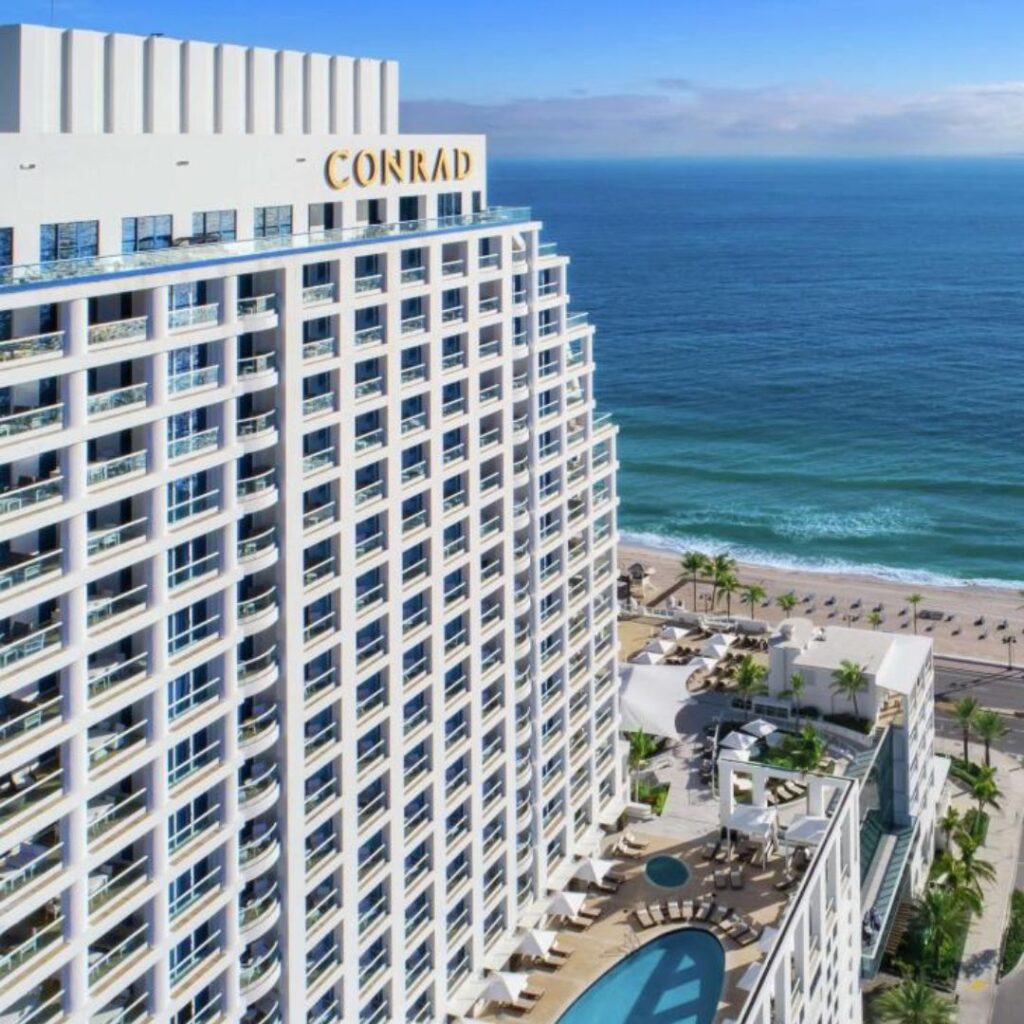 Large high rise building against a beach backdrop