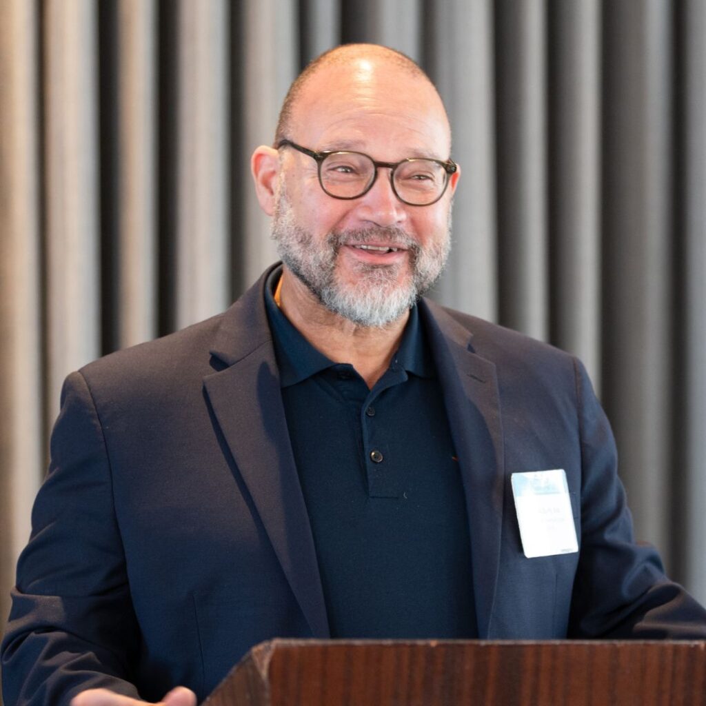 NELI employee presenting at a conference