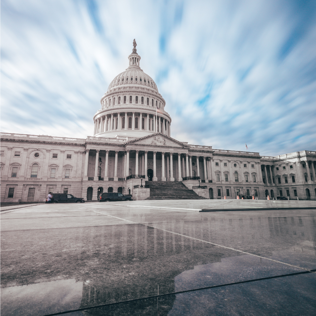 Large beautiful legal building against a blue sky.